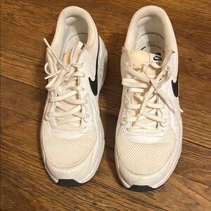 Nike White Athletic Shoes with Black Logo